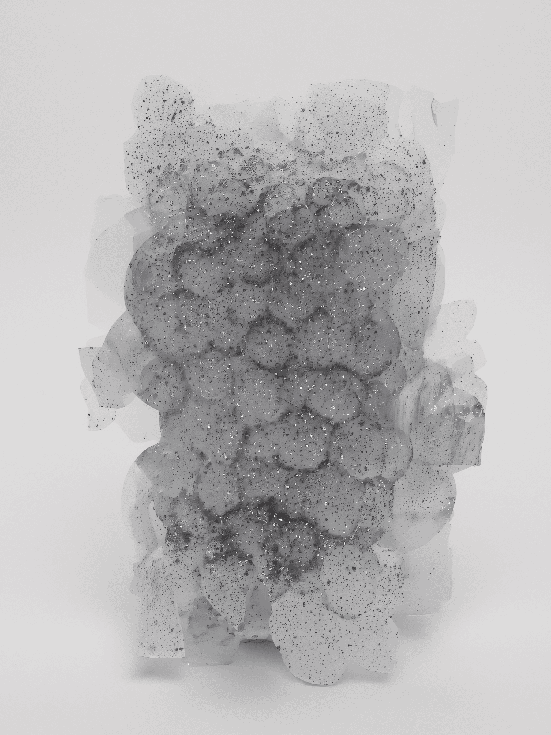 Abstract glitter resin sculpture resembling clustered bubbles on white background—minimal, modern art object.